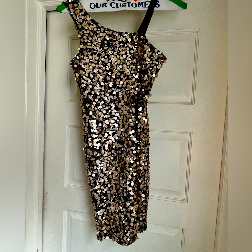 Girls’ size 14 black and gold sequin dress
